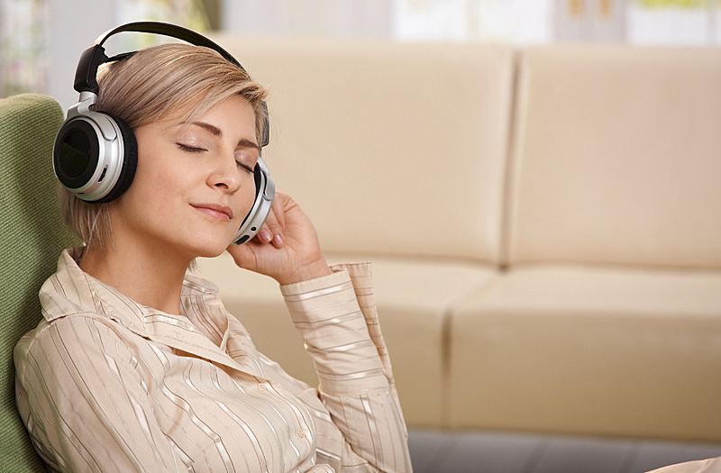 woman listening to a neuroacoustics meditation program