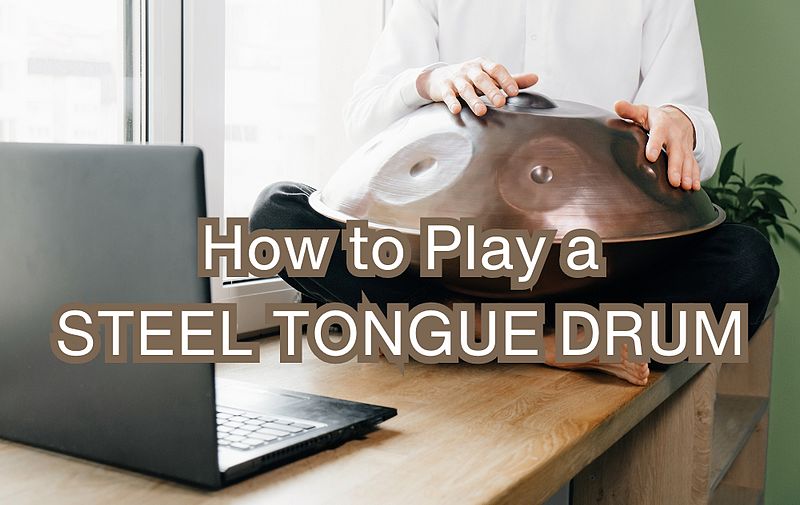 man learning how to play a steel tongue drum